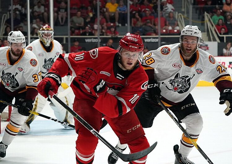 Steven Lorentz and Jake Bischoff during the 2019 Calder Cup Finals - Game 1 between the Chicago Wolves and Charlotte Checkers on June 1, 2019, highlighting Steven Lorentz stats and his impact on the game